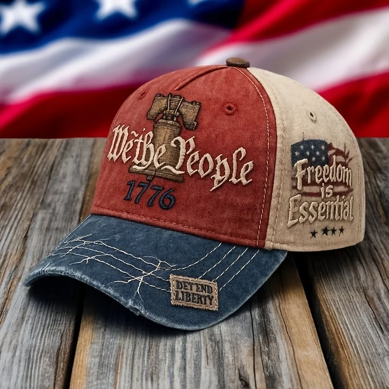 "We the People" embroidered baseball cap - Red-beige fabric, blue brim with "DEFEND LIBERTY" emblem, vintage wood grain surface