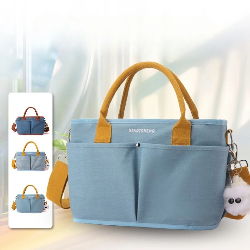 

Large Capacity Multi Compartment Handbag, Used for Carrying Diapers, Toys, Snack Bottles Diaper Bags Baby Stroller Storage Bag