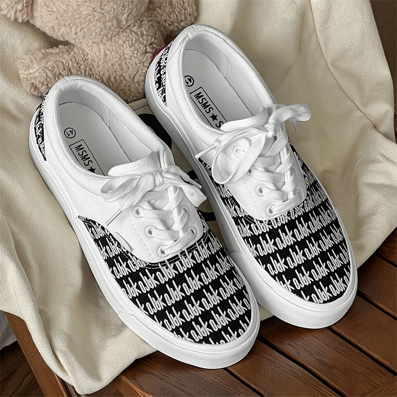 2024 New Women Canvas Shoes Fashion Print Casual Sneakers Men Trend Letter Vulcanize Shoes Comfortable Skateboarding Sneakers