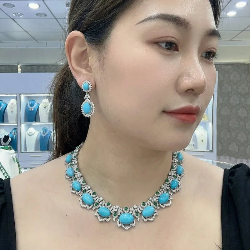

Дизайнерский комплект украшений: серьги и ожерелье для женщин, инкрустированные кубическим цирконием, с овальными бирюзовыми кисточками, для вечерних мероприятий