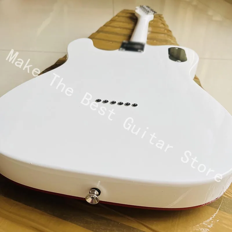 Pure white bright colored electric guitar, exquisite red pickup, quality assurance, fast delivery.