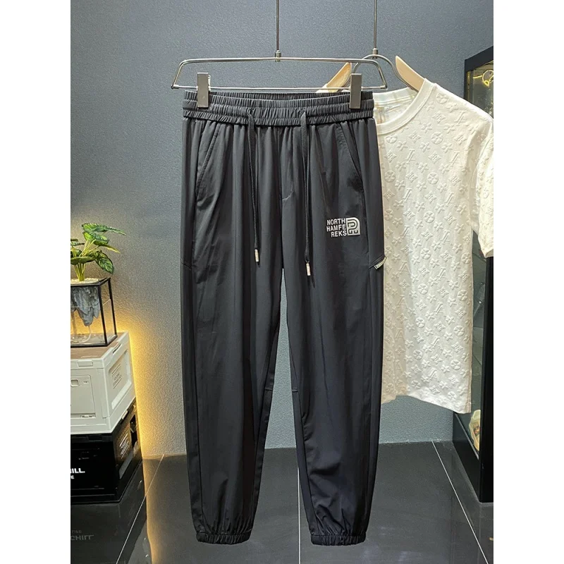 Light luxury draping silky casual pants men's summer Thin Ice Silk quick-drying cool cropped sports jogger pants