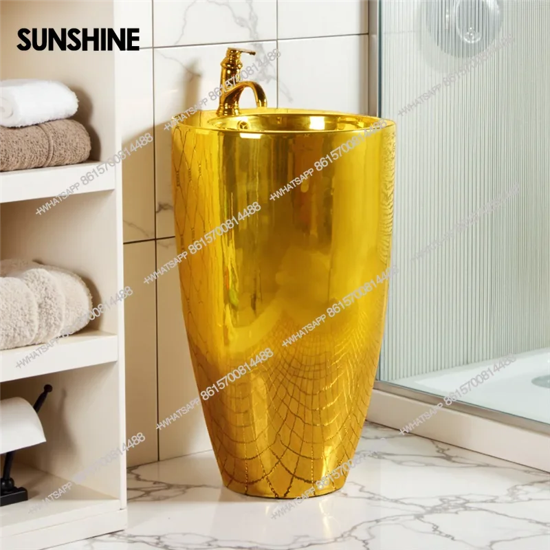 新しいヨーロピアンスタイルの金色の柱型洗面台、明るい金色の質感の一体型床デザインのバスルームY