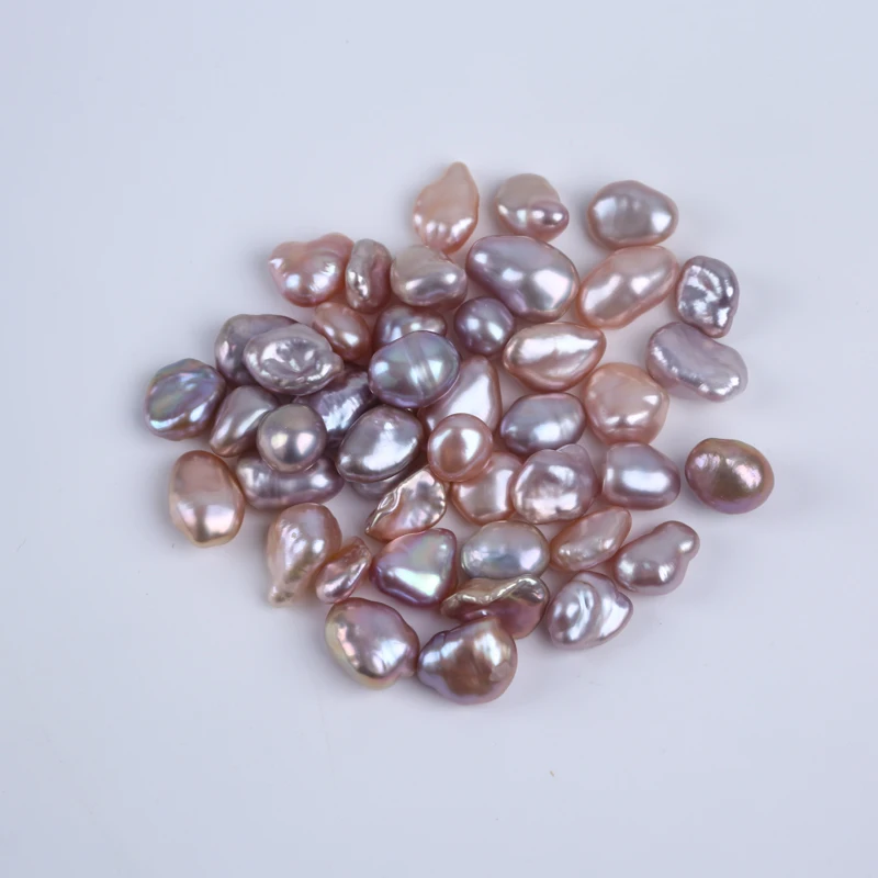 

Natural Pearls Wholesale 7-9mm Natural Purple Keshi Irregular Shape Freshwater Pearl Loose Beads