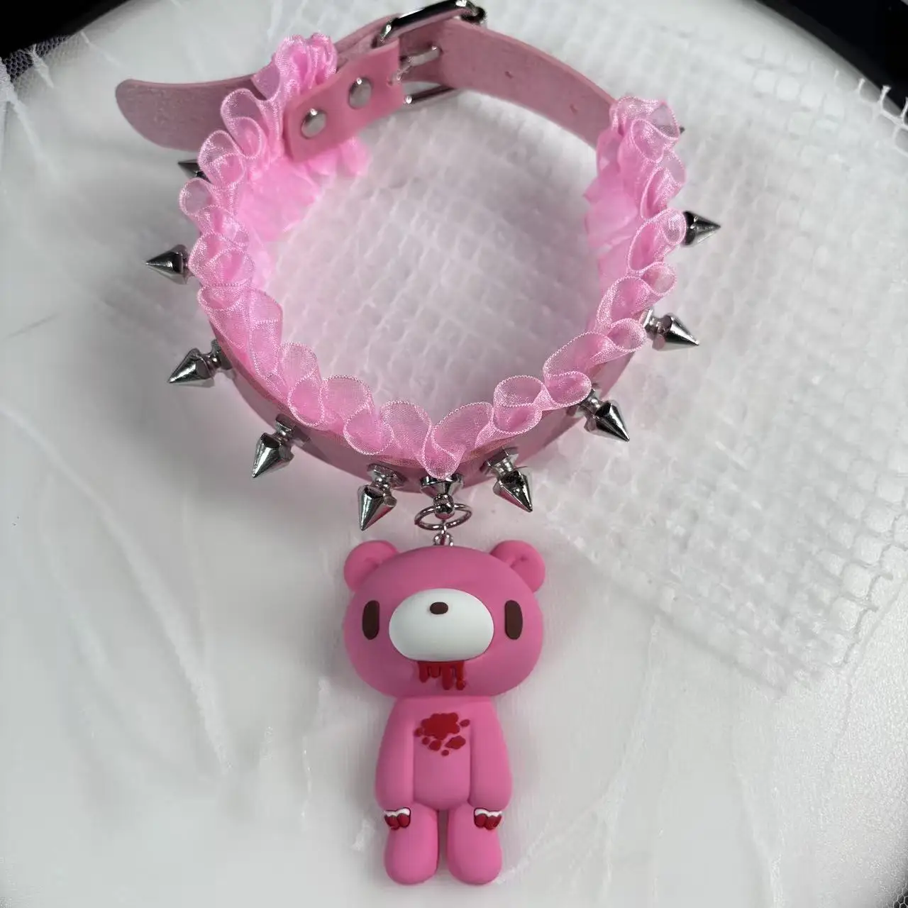 Edgy Bloody Bear Choker Necklaces - Cute yet dark bear pendants with spiked, ruffled collars. Bold alternative style.