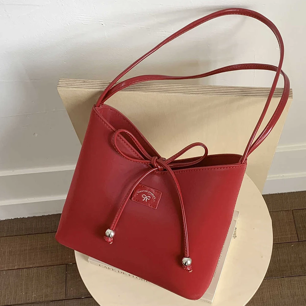 

Exquisite Bow Red Bucket Shoulder Bags Women 2025 New Fashion Commuting Versatile Single Shoulder Armpit Bag Lady Underarm Bag