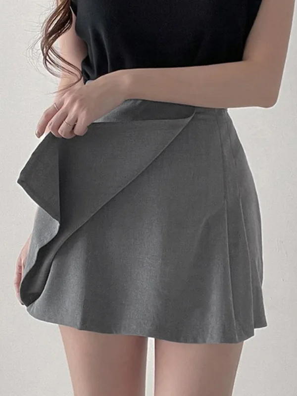 Wiosna/lato wersja koreańska nowa jednolita, wąska plisowana spódnica z wysokim stanem damska kopertowa krótka spódniczka w kształcie litery A D729