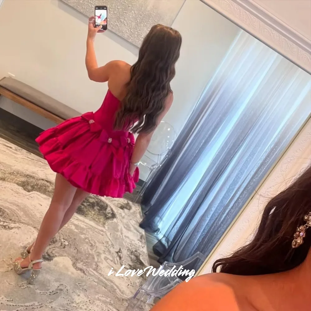 Rosa Perlen trägerloser Minirock Taft ärmellose Schleife Heimkehrkleider A-Linie plissiert modernes Geburtstagspartykleid individuell