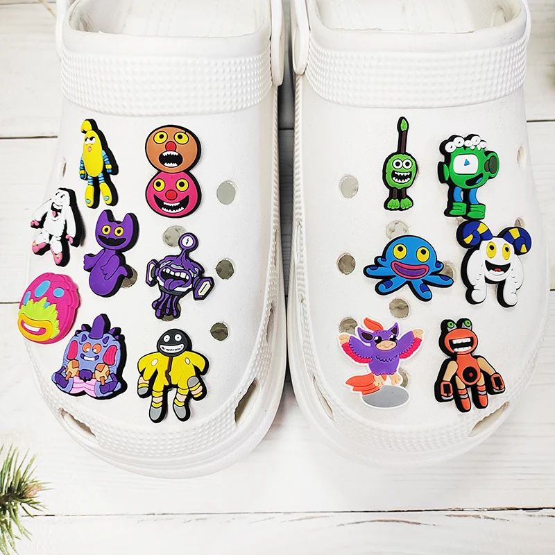 سلسلة كرتونية لألعاب موسيقى الوحش للأطفال ، سحر الأحذية ، إكسسوارات السدادة الكلاسيكية ، هدايا الديكور ، 15 في كل مجموعة