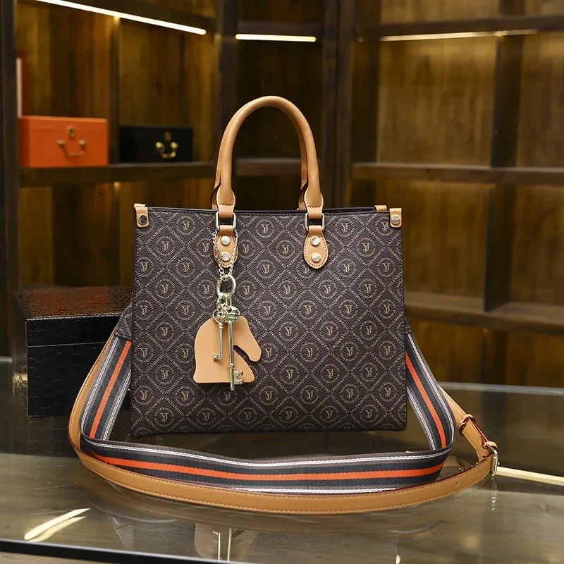 

Timeless Handbag By Famous Designer For Women, Crafted From Supple With Gold Accents And Roomy Compartments Ladies Essential