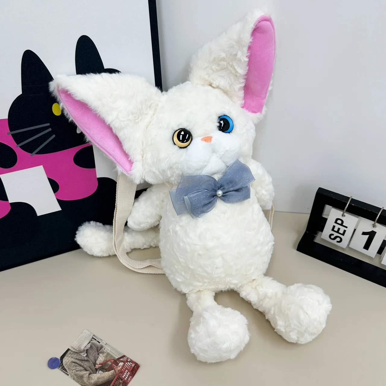 ตุ๊กตาแมวการ์ตูนขนนุ่ม ของเล่นใหม่ น่ารัก แมวเดวอนขนหยิก กระเป๋าเป้สะพายหลังตุ๊กตาแมวสุดสร้างสรรค์ กระเป๋าสะพายไหล่ตุ๊กตาแมว ของขวัญวันเกิดสำหรับเด็กผู้หญิง