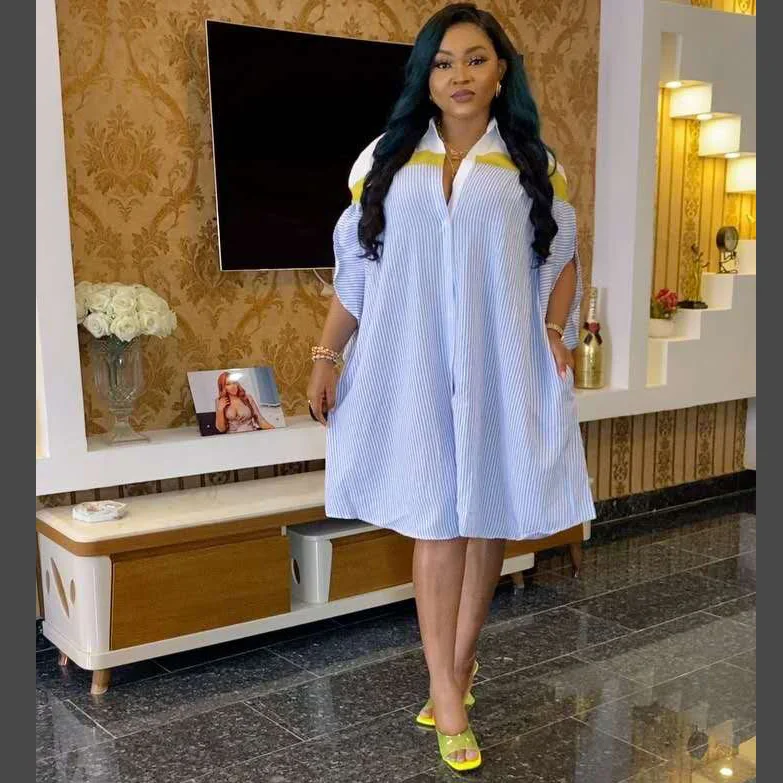 Camicia elegante africana europea e americana stile a righe alla moda e confortevole