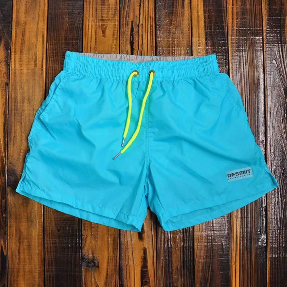 Summer New Mens Solid Color Sports Shorts Fashion Trend Leisure Loose Simple Quick-Drying Breathable Seaside Vacation Men Bottom