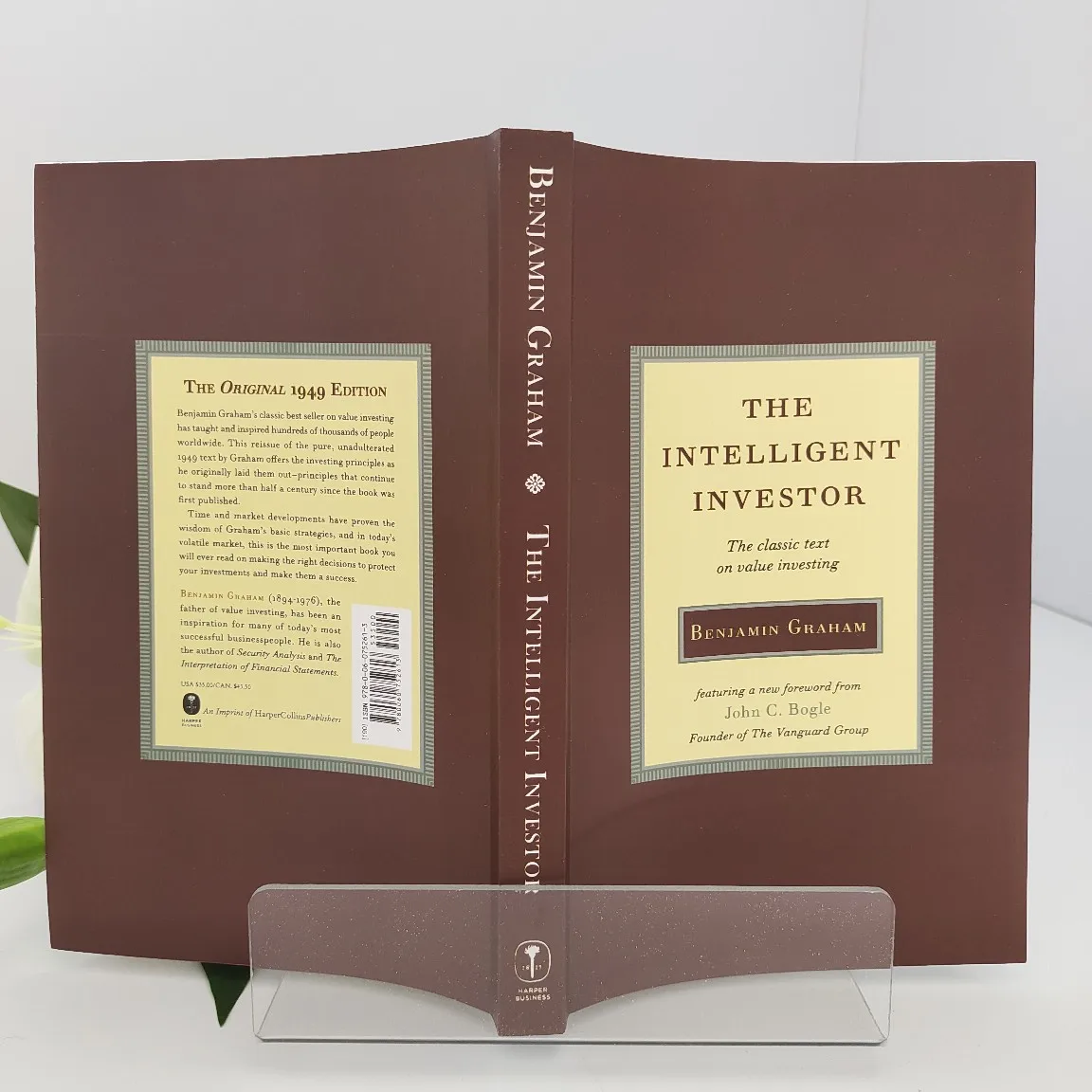 The Intelligent Investor by Benjamin Graham: The Essential Guide to Defensive Investing & Long-Term Value