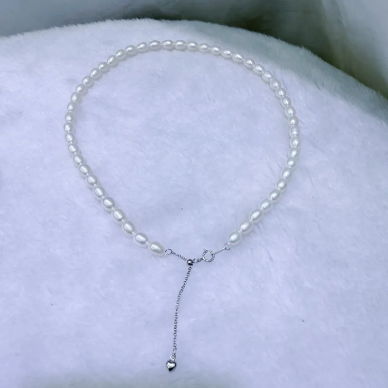 

Natural Freshwater Pearl Necklace 5...6mm Rice Shape Almost Sterling Silver