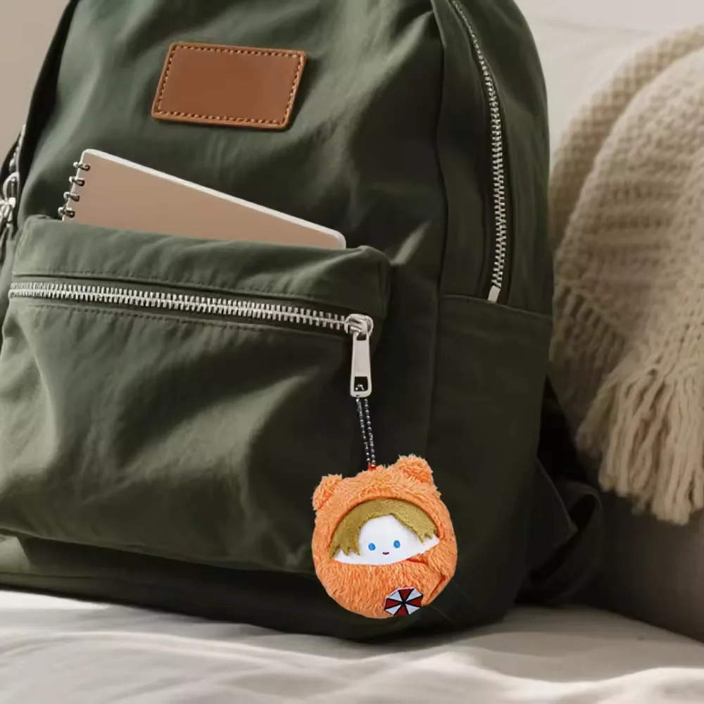 جديد 10 سنتيمتر Biohazard المقيم الشر ليون S. كينيدي ألعاب من القطيفة لطيف على ظهره قلادة محشوة المفاتيح دمية الاطفال هدايا عيد الميلاد