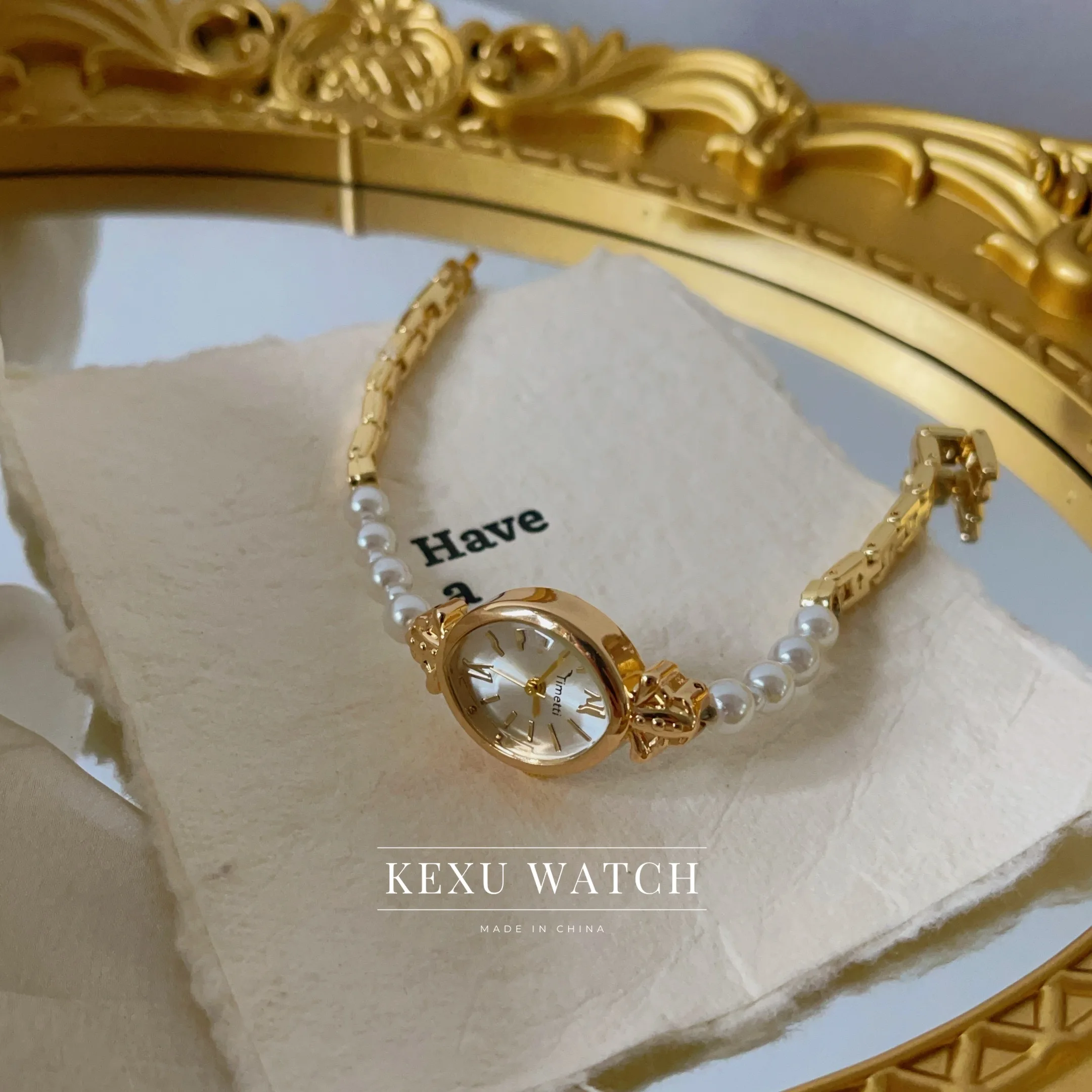 ساعة تيميتي للنساء، ساعة نسائية بسوار من اللؤلؤ مستوحاة من الطراز القديم، ساعة نسائية على الموضة ذات وجه بيضاوي للبيع بالجملة