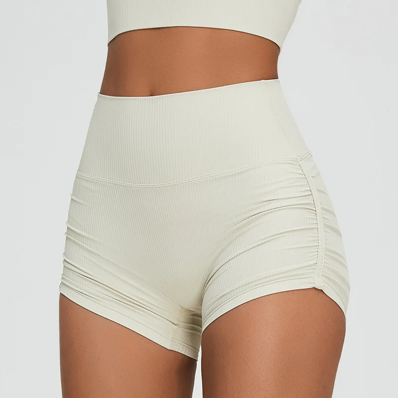 Pantalones cortos deportivos plisados para mujer, Shorts ajustados con realce de cadera, secado rápido, triples, para Yoga