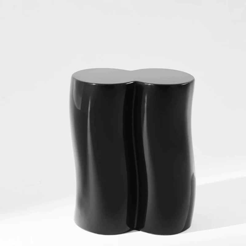 A low  a stool that can be seated and moved