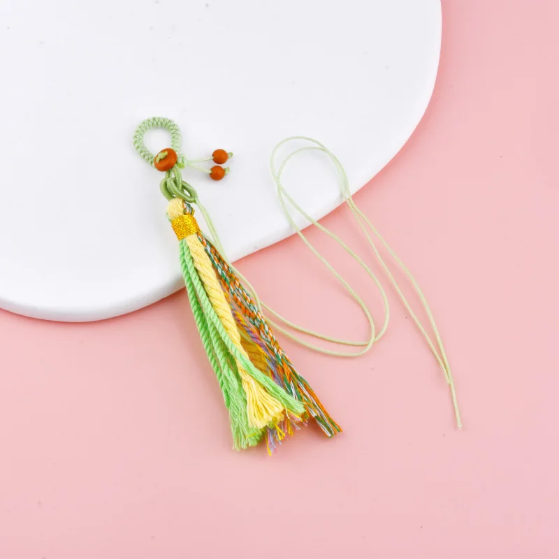 Hand-knitted cotton thread Tibetan-style tassel pendant. Handmade DIY item that can be used as various pendants or beads.