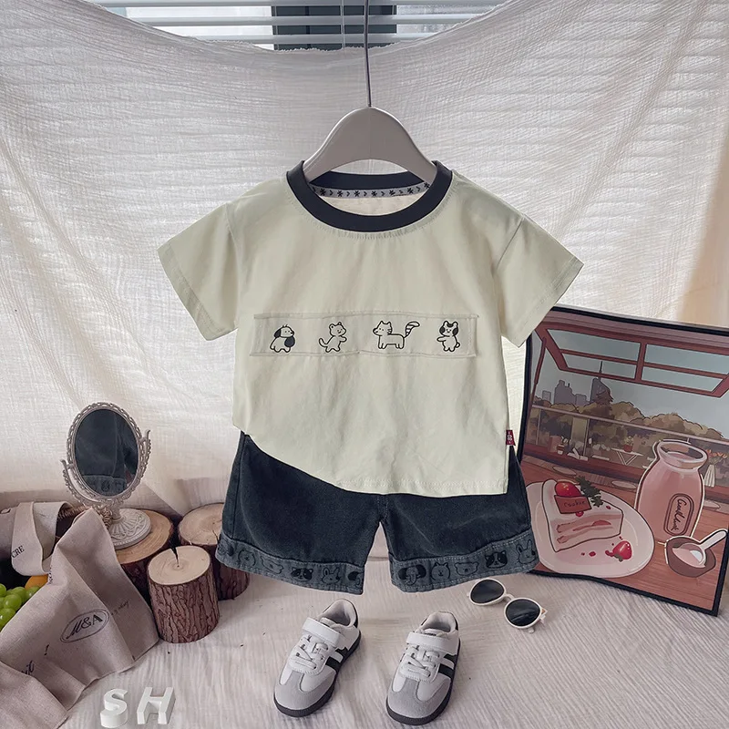 بدلة أطفال 2026 ملابس صيفية للأطفال الأولاد ملابس أطفال لطيفة مطبوعة على شكل كلب بأكمام قصيرة تي شيرت علوي وسراويل قصيرة طقم مكون من قطعتين ملابس للأولاد #2