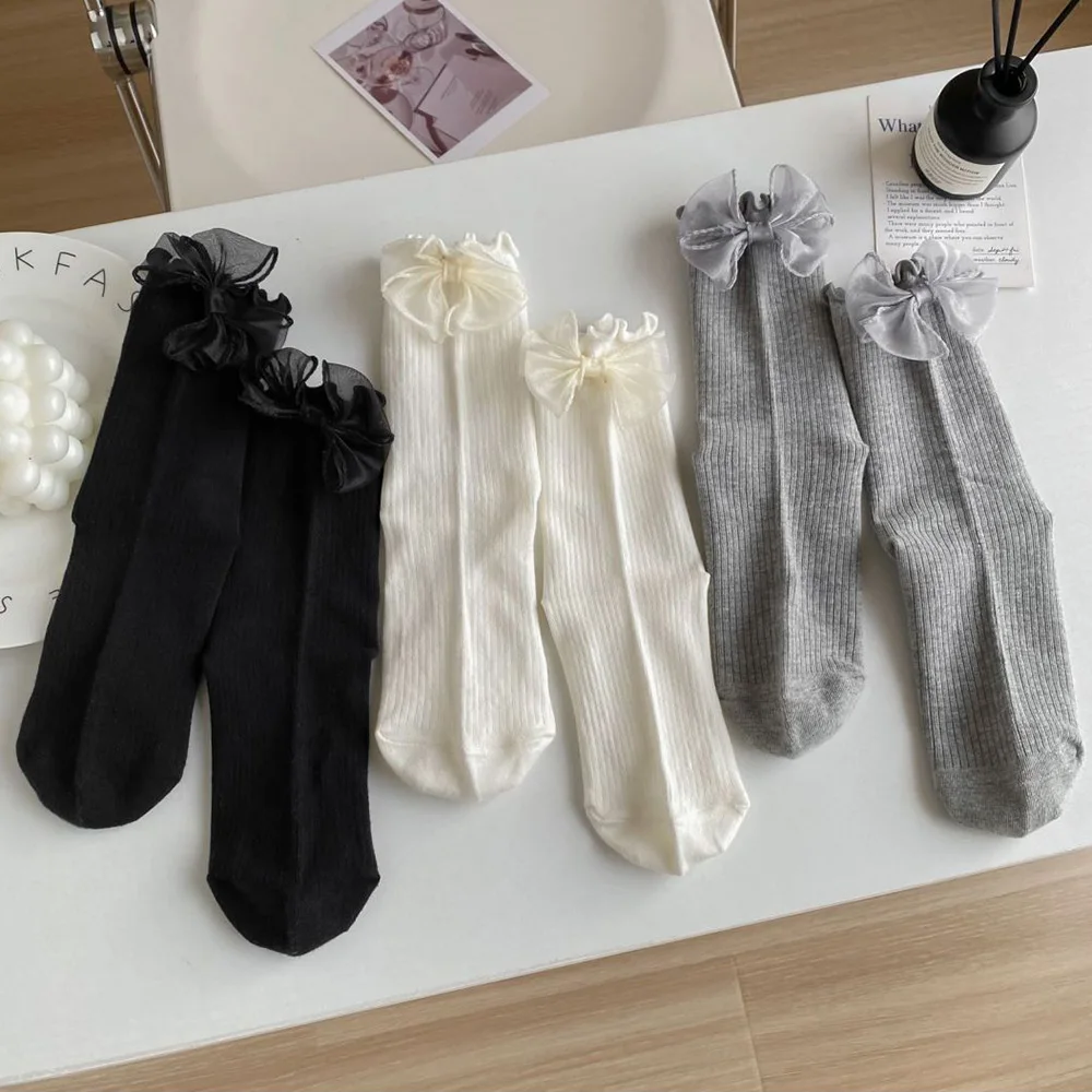 

Korean Style Women Socks Fashionable Street Lettuce Trim Solid Color Cute Bow Glamorous Socks Female Middle Tube Autumn Winter