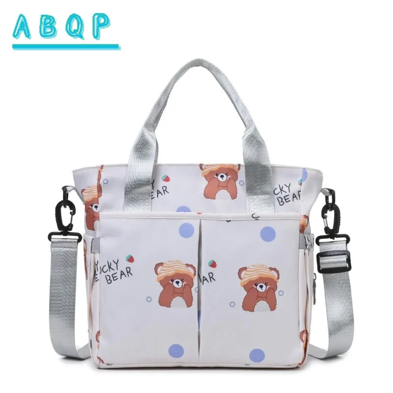 ABQP New Diaper Bag Handbag Luxury Brand Cartoon Baby Diaper Shoulder Bag Large Capacity Fashionable Baby Products Storage Bag