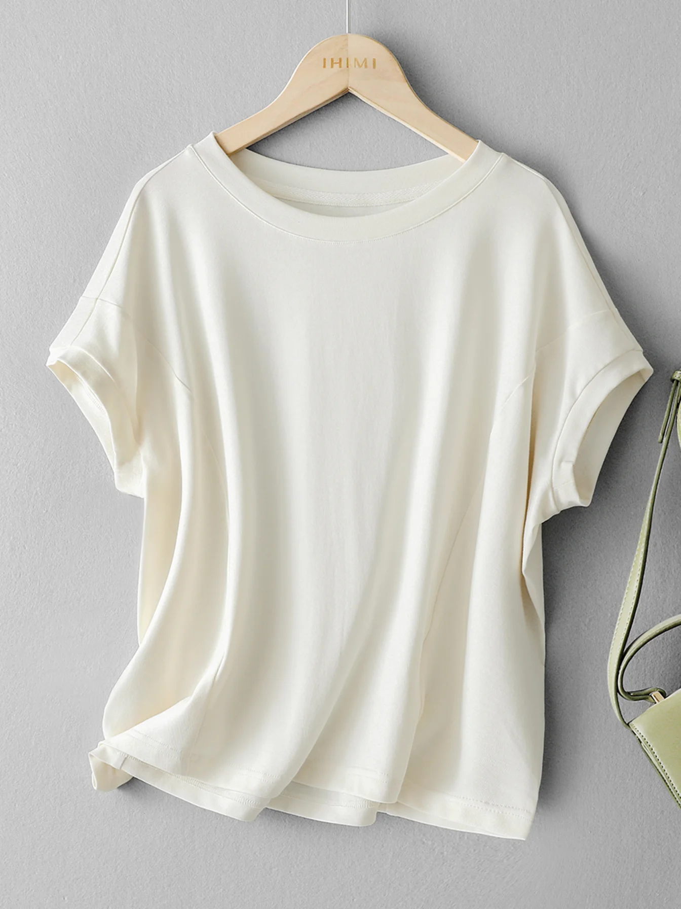 

2024 Fashion Women Casual Loose T shirt Solid colour round neck T-shirts design sense short-sleeved summer popular clothes