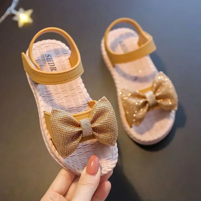 Scarpe per bambini sandali estivi per ragazze fiocco antiscivolo suola morbida Versatile solido coreano bambini dolci scarpe da principessa sandali