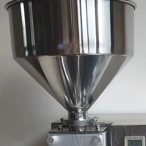 

Автоматическая машина для наполнения кремом, пастой, ореховой начинкой и начинкой из слоеного теста для кексов и капкейков