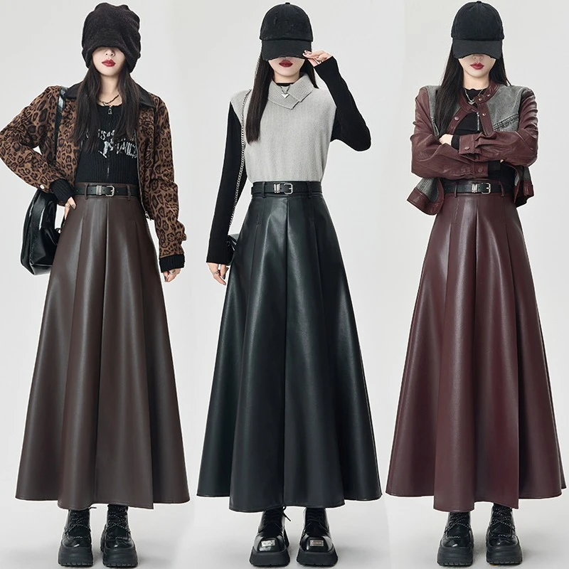 الخريف الشتاء عالية الخصر الأسود بولي Leather جلد المرأة مظلة تنورة طويلة مع مربوط 2025 جديد خمر مستقيم ألف خط التنانير الإناث