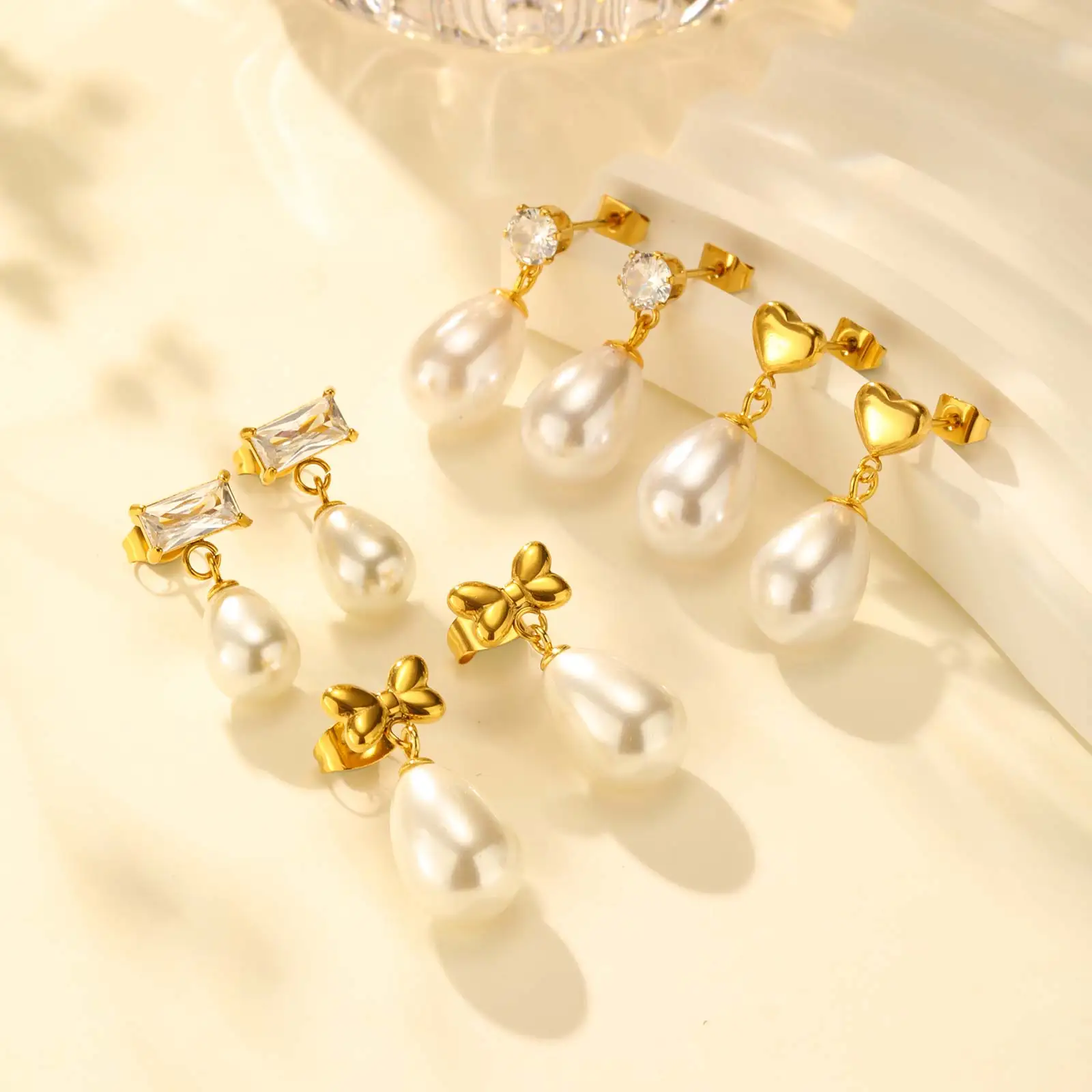 

Elegant Bow Imitation Pearl Earrings for Women Girls,Gold Plated Stainless Steel Bowknot Stud Earrings, Fashion Jewelry Gift