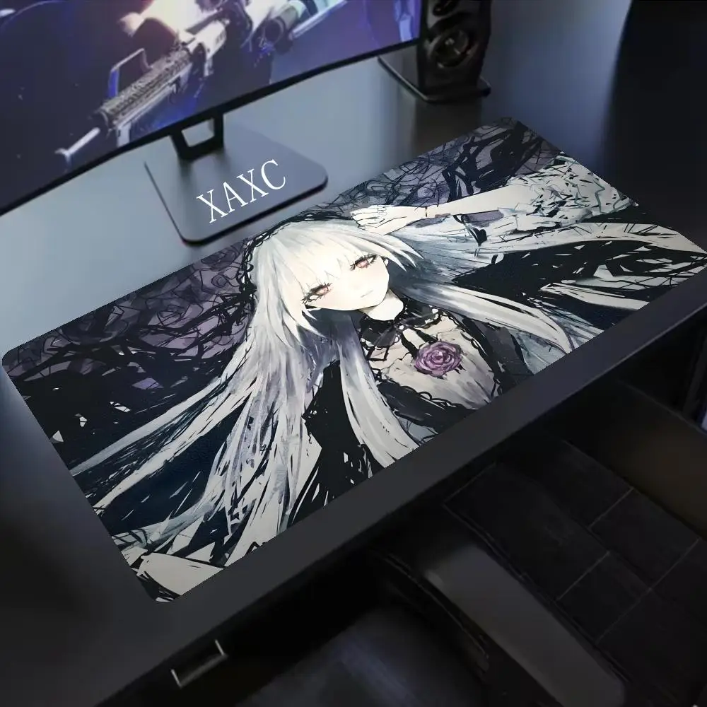 Elevate your setup with dark elegance. This themed mouse pad features striking artwork, providing a smooth,  base for your  XAXC
