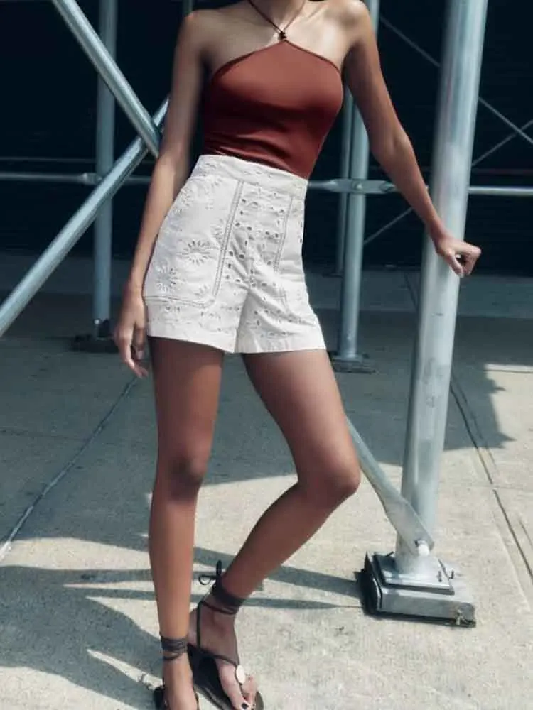 

European style new women's fashion versatile simple solid color solid color hollow embroidery high waist shorts