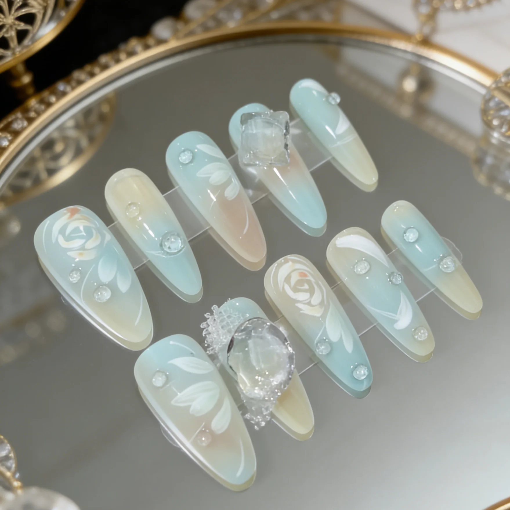 Ten pieces of hand-pressed, water-drop-shaped wearable nail 