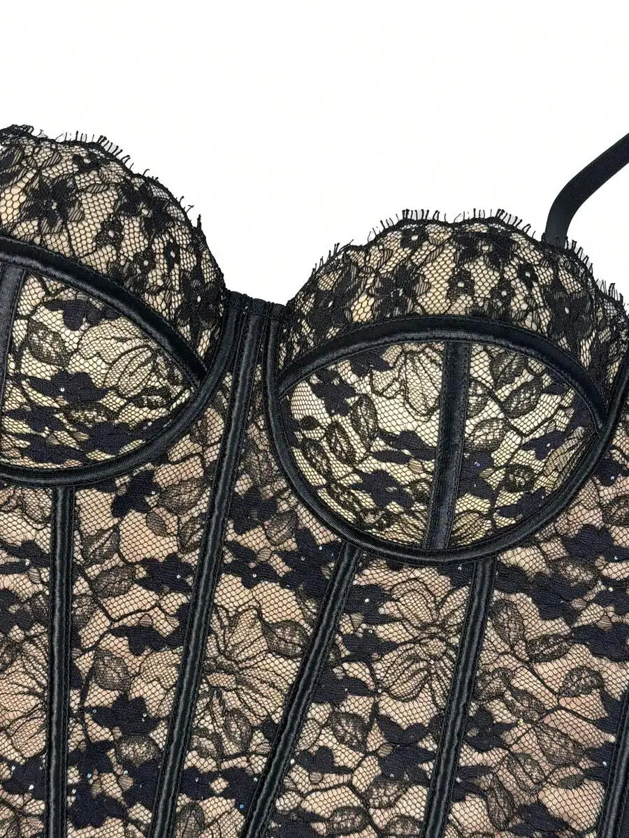 Top corsé de encaje negro para mujer, con detalles florales, y body moldeador.