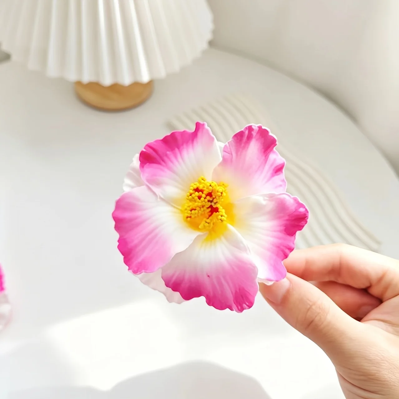 1 piece beach-style faux sunflower pink hair clip for women, creating a romantic beachy vibe for photo shoots—side hair clip for
