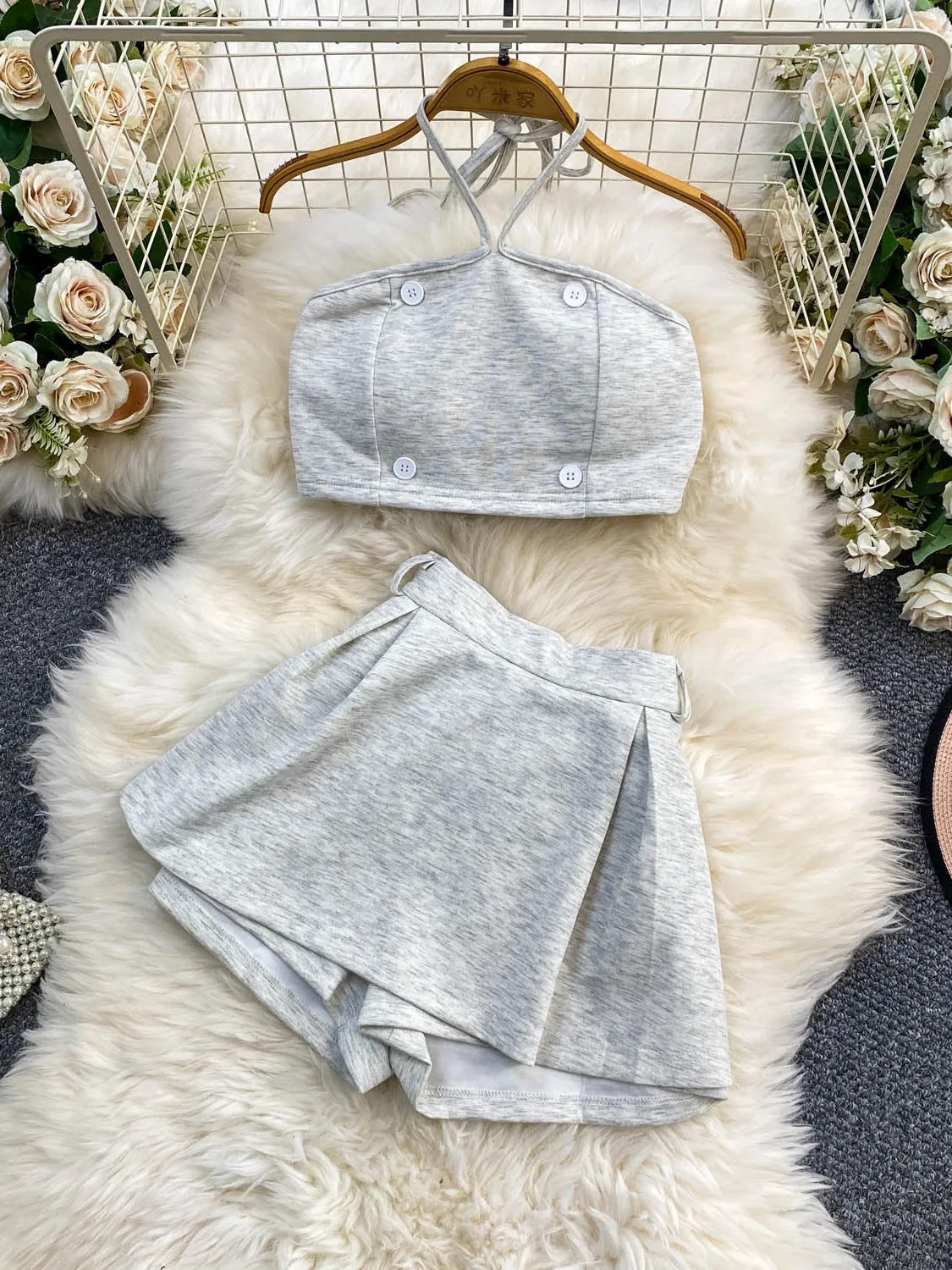 

Pure Desire Spicy Girl Millennium Backless Top with Chest Pad Hanging Neck High Waist Slim Short Skirt Knitted Two-Piece Set