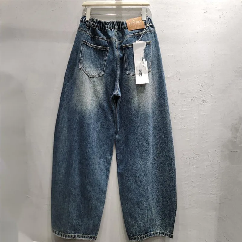 ANJY Spring Autumn New Women Fashion Slant Buttons Designs Washed Jeans Vintage Distressed High Street Curved Denim Pants A28218