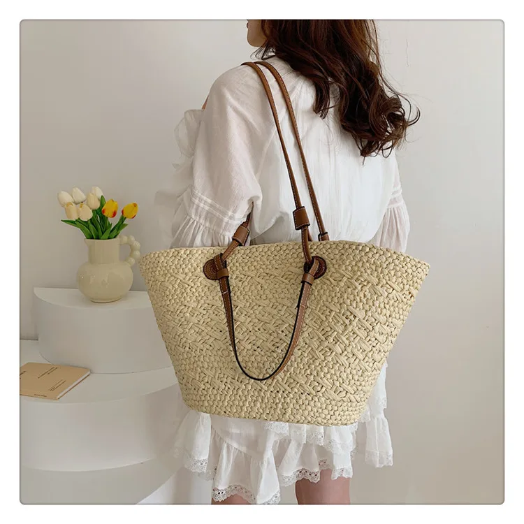 New Fashion And Versatile Seaside Vacation Hollowed Out Woven Bucket Shaped Large Capacity Single Shoulder Tote Bag For Women