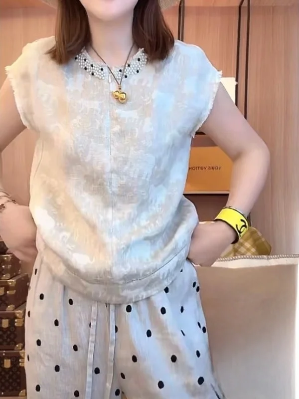 Ciężko zdobiona lniana bluzka lub sukienka damska letnia luźna plus size casual wyszczuplająca z efektem modelującym sylwetkę, haftowana.