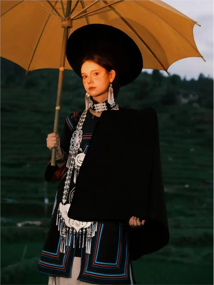 

New photography of traditional women's striped cotton and linen costumes for the Torch Festival performance
