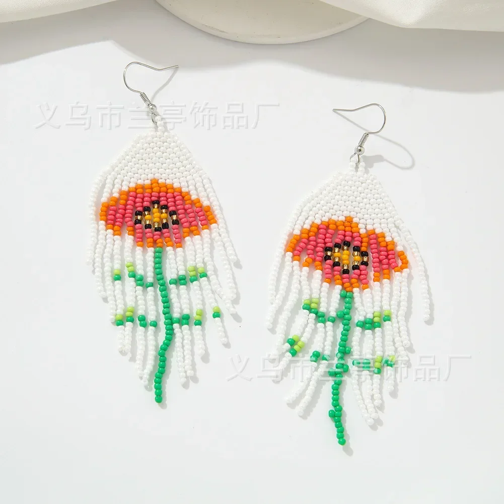 Beaded earrings Tassel Rose Design Originality Hand knitting Bohemia Alloy Tide Simple Versatile Female Rice bead earrings