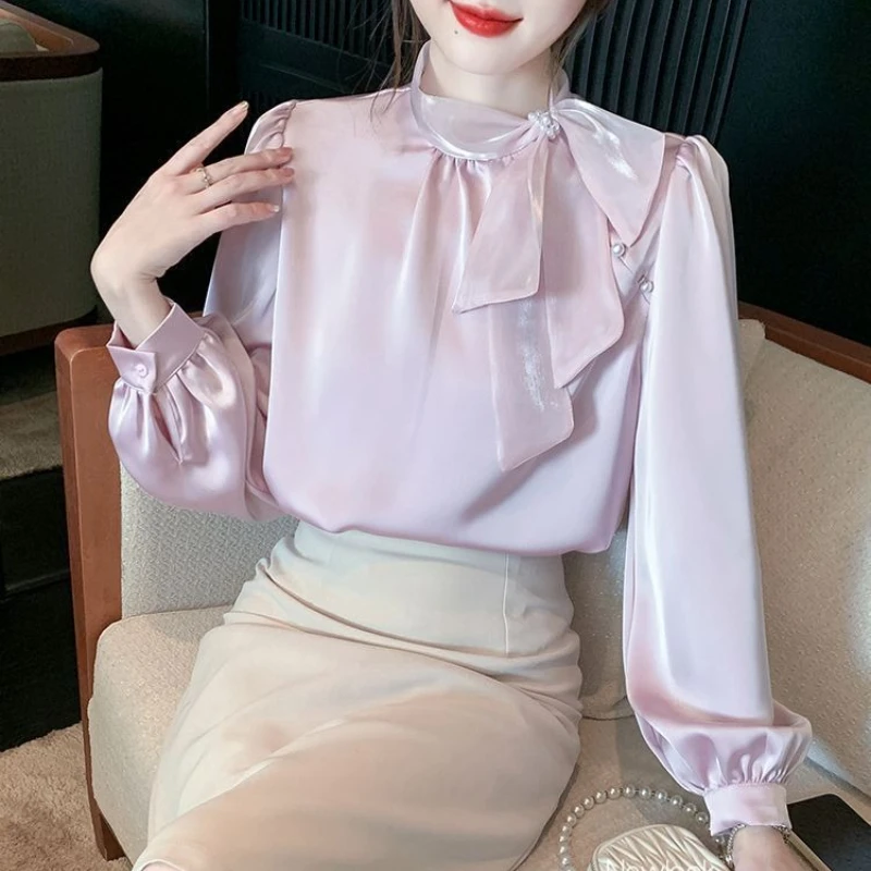 بيج امرأة علوية ربطة عنق عادية حديثة طويلة أنيقة وشبابية أنيقة بيع القمصان والبلوزات الاجتماعية الجديدة 2025 للنساء