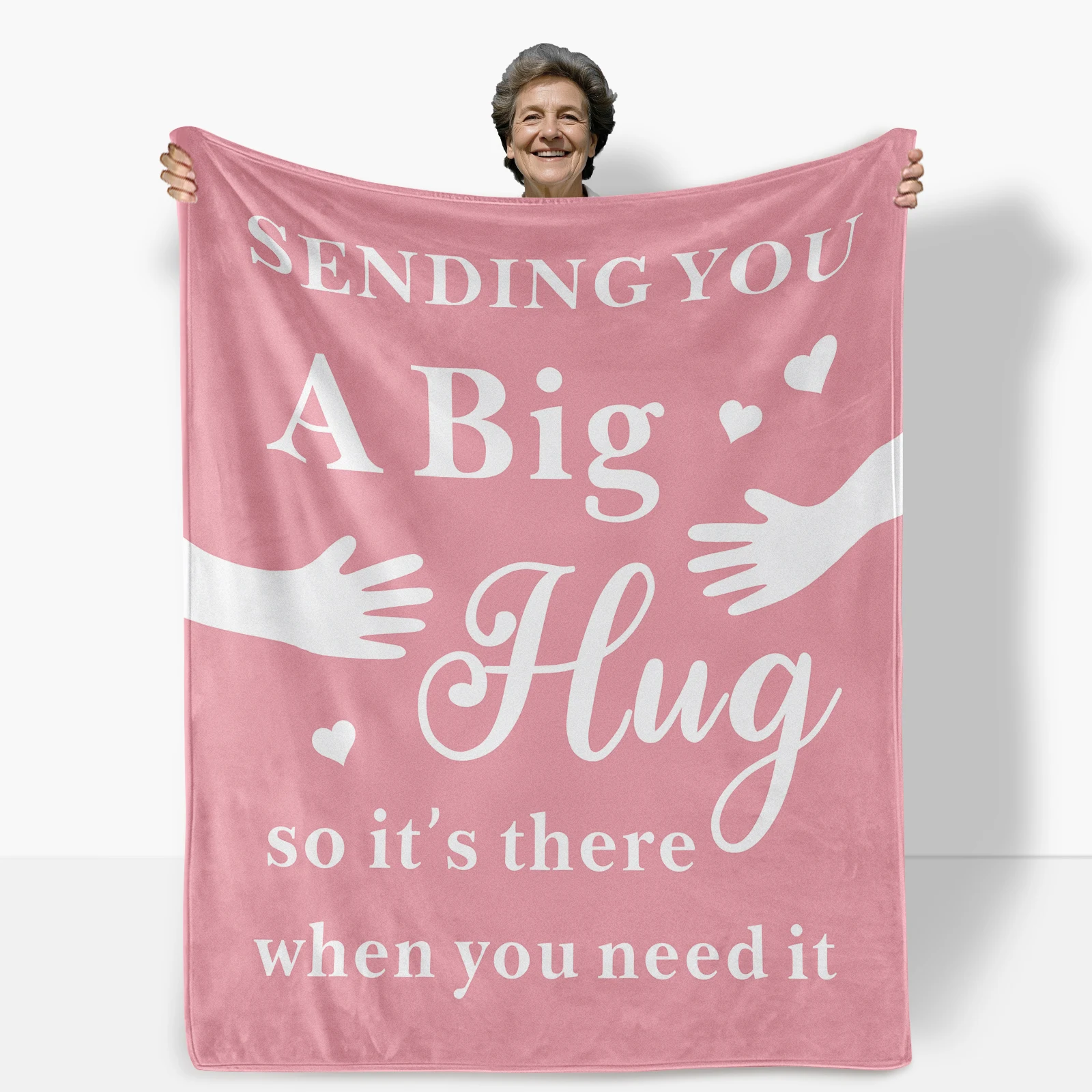 

Fluffy pink flannel blanket themed around embracing hands with encouraging words provides heartfelt comfort and positive energy