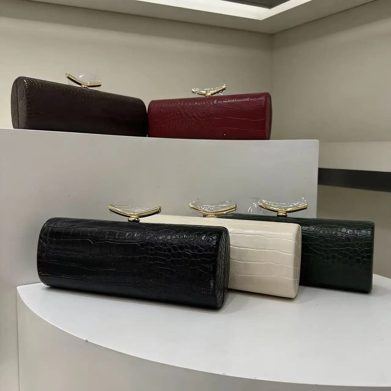 

Warm brown crocodile-patterned long rectangular handbag - trendy date party bag with an unconventional design