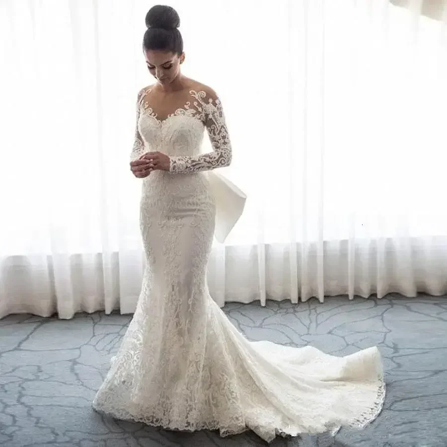 Customized Mermaid Wedding Dresses Sheer Neck Long Sleeves Illusion Lace Applique Bow Overskirts Button Back Chapel Train Gown
