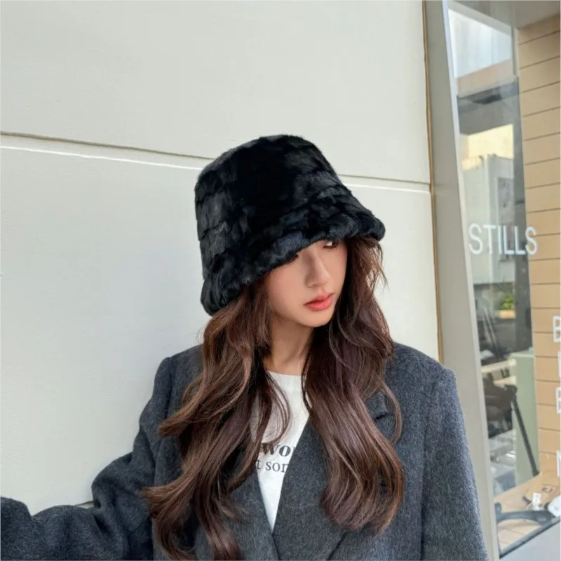 A fur hat for women in winter fisherman's coat warmth black that shows off the face and small bucket basin