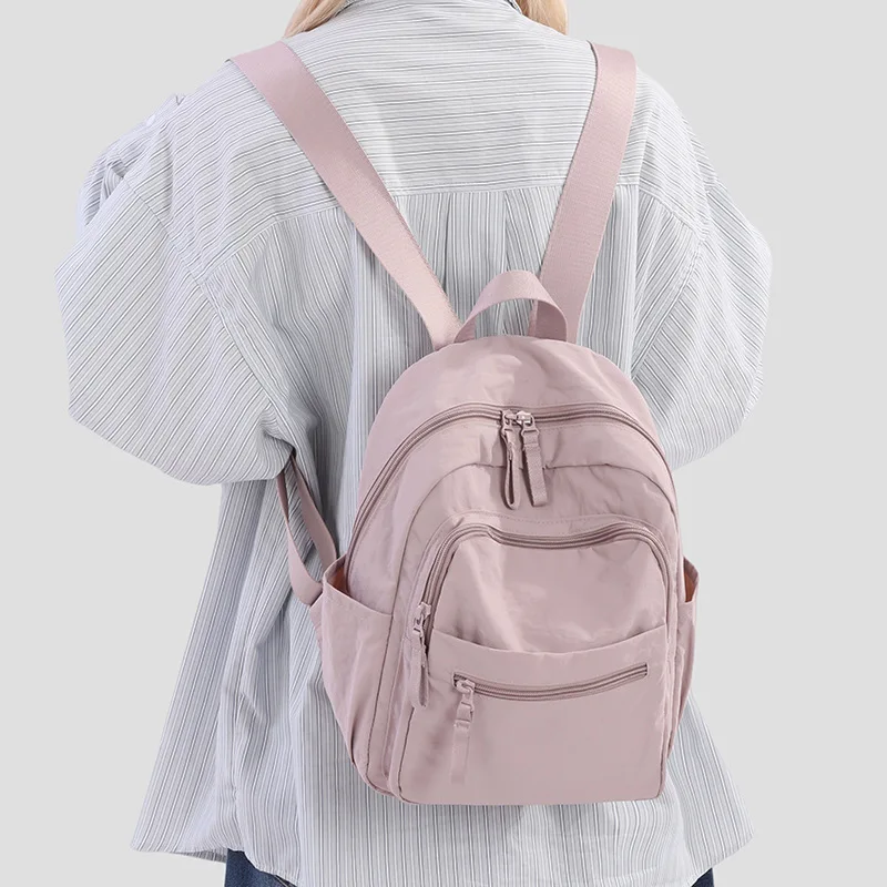 Lightweight Pink Nylon Backpack for Women - Water Resistant Multi-Pocket Travel & Work Bag