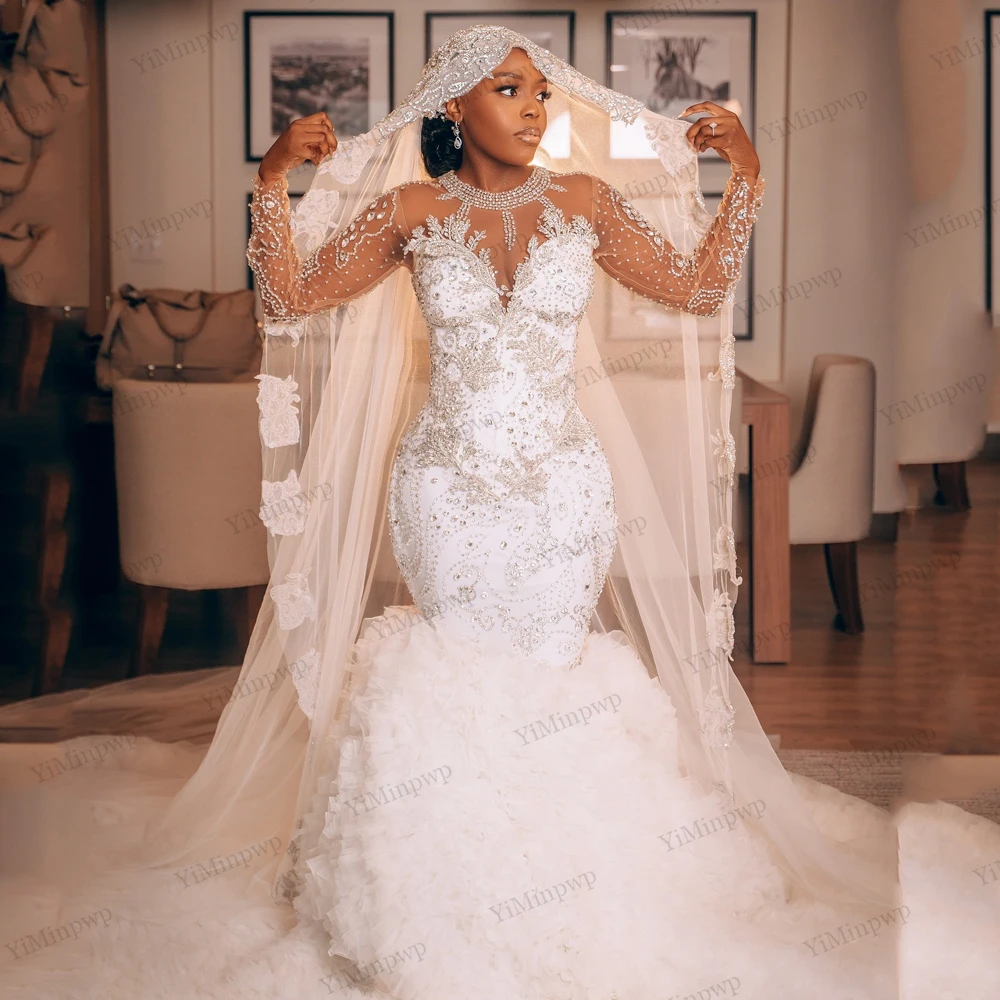 

Customized Africa Luxury Mermaid Wedding Dresses 2026 With Ruffle Train Full Sleeve Crystals Beaded Lace Wedding Dress Women